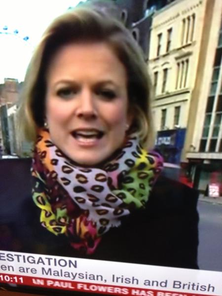 Help me identify this scarf on this BBC reporter