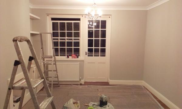 Can i paint a north facing living room with grey? Does a warm tone exist?