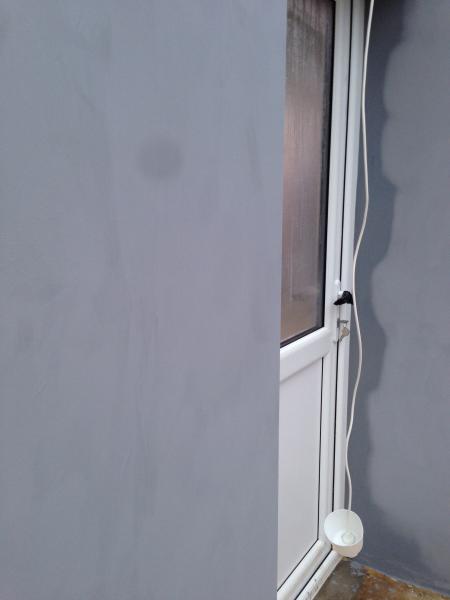 Can i paint a north facing living room with grey? Does a warm tone exist?