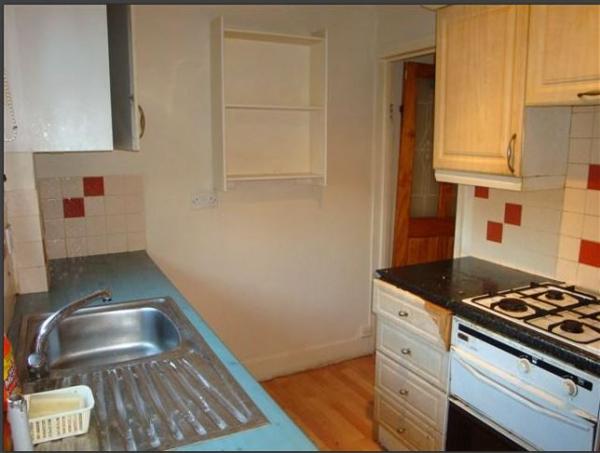 Rescuing a VERY cruddy kitchen on a budget?