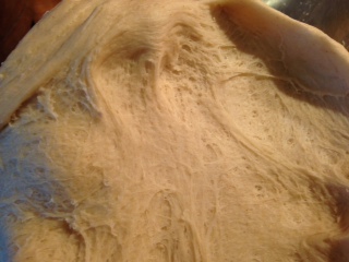 Why is my white bread still doughy and a bit tough?