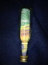 What can I do with lots of tiny pretty shaped glass bottles?