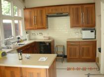 New kitchen: does the flooring go first and under the units?