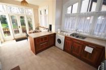 New kitchen: does the flooring go first and under the units?