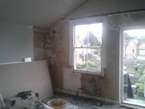 Mysterious damp patches on external wall