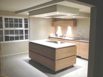 We've planned our kitchen with a hob on the peninsula. What are our options for extractor fans?