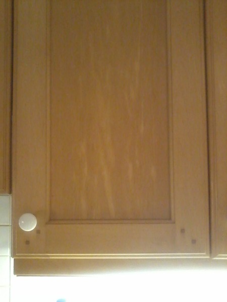 What style handles in this sad 90s kitchen?