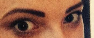 Enormous black eyebrows.  Is this a thing??