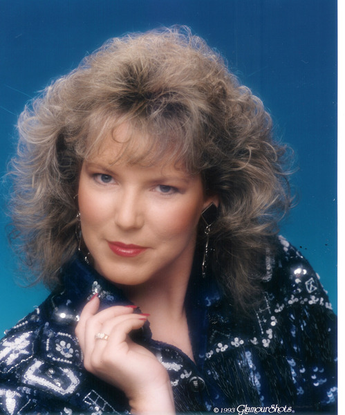 aibu to not want my Glamour Shot on display?