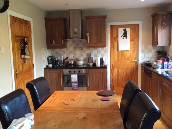 If I post some pictures of my tiny kitchen that has THREE doors leading into it, will you tell me if there is anything I can do with it?