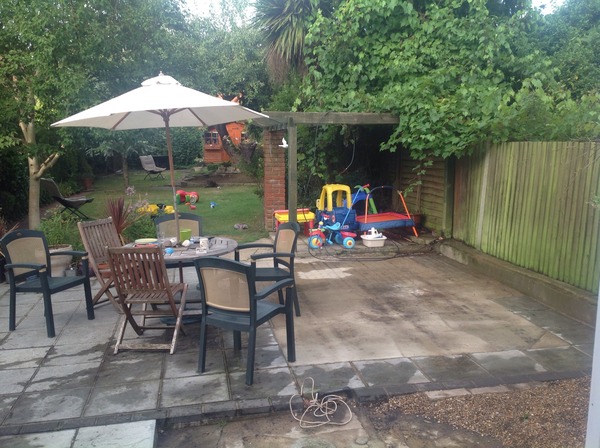 There is a tiny elderly Korean lady in my garden and I want to go out.