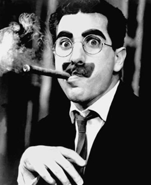 Enormous black eyebrows.  Is this a thing??