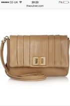 Anya Hindmarch. Who the hell is buying this shit?