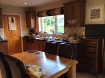If I post some pictures of my tiny kitchen that has THREE doors leading into it, will you tell me if there is anything I can do with it?