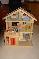 Anyone know who makes dolls houses like this please?