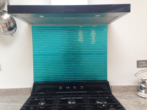 New kitchen- tiles or one of these steel/glass splashbacks?