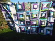 What colour back for this patchwork quilt?