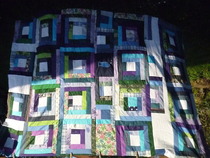 What colour back for this patchwork quilt?