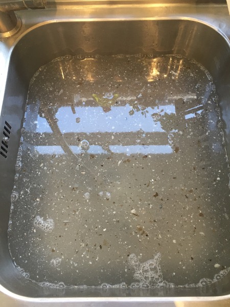 Cleaning the drawer in a washing machine.