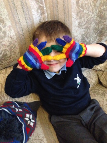 Can anyone knit DS1 some stripy rainbow gloves?