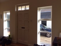 How should I cover the doors and windows in my hall?