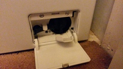 My washing machine stinks! Any ideas on how to stop it?