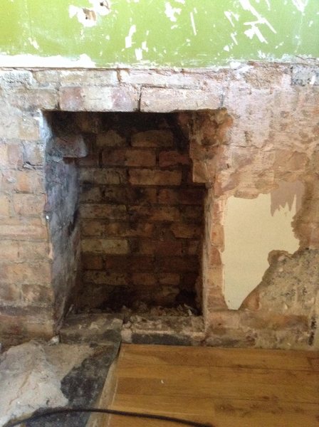 step by step photos of fitting a wood burning stove