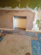 step by step photos of fitting a wood burning stove