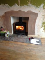 step by step photos of fitting a wood burning stove