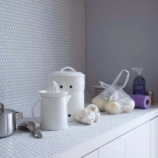 You know those big sheets of Mosaic tiles - can I stick them to a cacky ugly worktop?