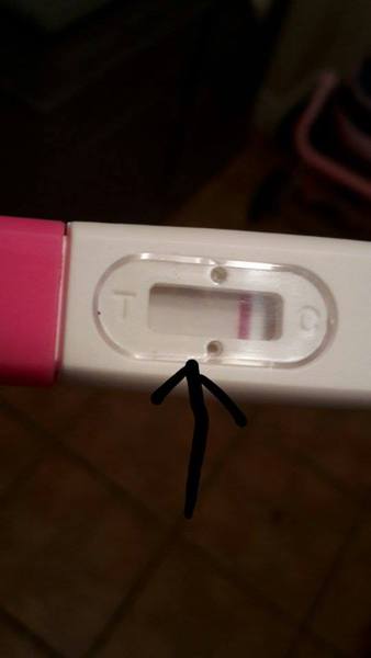 I need help reading this pregnancy test not sure if there's a second line?