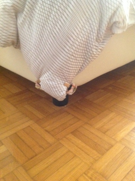 Duvet cover extension "tongue" for tucking under mattress.