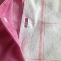 Duvet cover extension "tongue" for tucking under mattress.