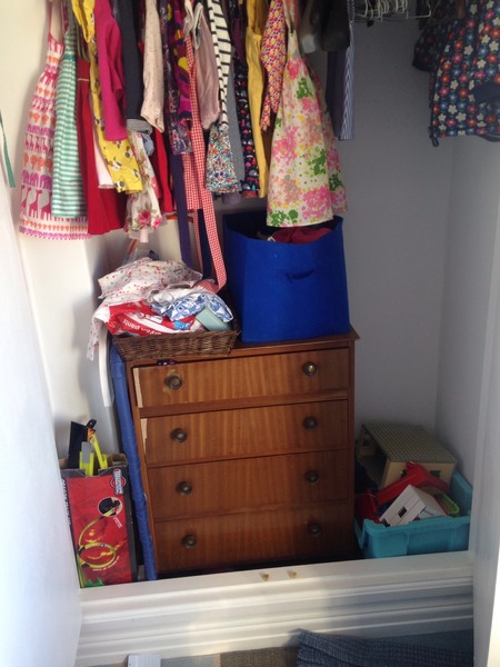 Help please! How to store clothes in this warsrobe.