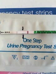 12dpo can anyone see a very very faint line?!