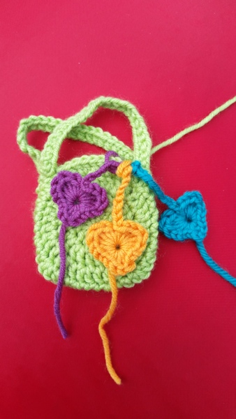 Woolly Hugs. A blanket for DashingRedHead's family. Can anyone help us please?