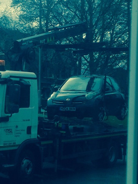 to call someone about the car parked outside my house?
