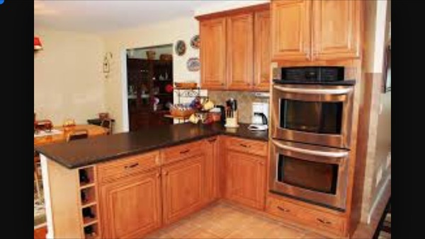 What can you store in a tiny gap next to the cooker?