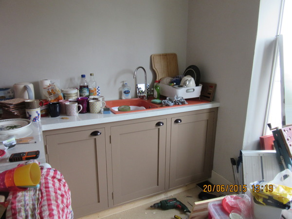 What can you store in a tiny gap next to the cooker?