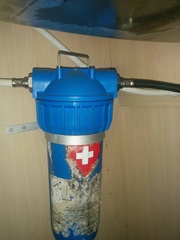 changing the water filter in a built in water filter tap