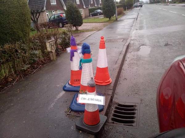 to be irritated with parking cones outside my house ?
