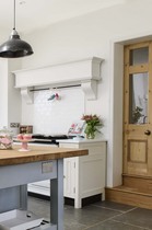 Is it possible to put a new door in a kitchen wall whilst saving the kitchen units?