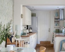 Is it possible to put a new door in a kitchen wall whilst saving the kitchen units?