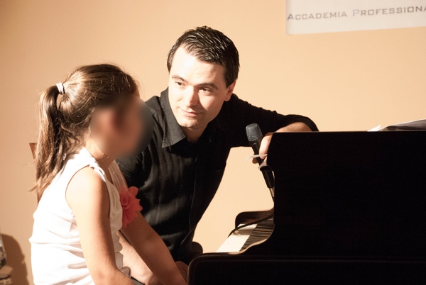 How much should I charge for beginner piano lessons?