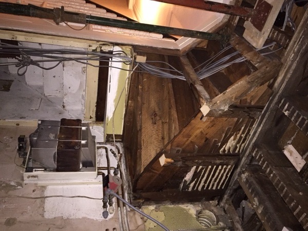 Solution for underside of stairs protruding in kitchen diner?