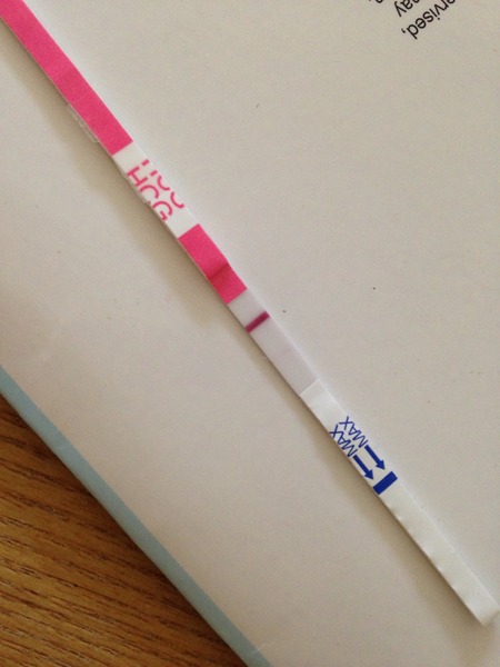 Pregnant? Maybe implantation, maybe a faint line....