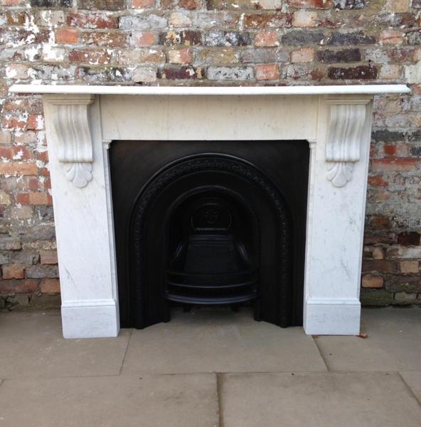 Can anyone help me choose between a gas fire and a real coal fire?