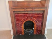 Trying to love my 1930s fireplace - what colour walls?