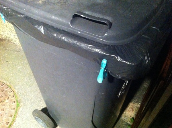 How do you stop the bin liner in your wheelie bin from falling in?