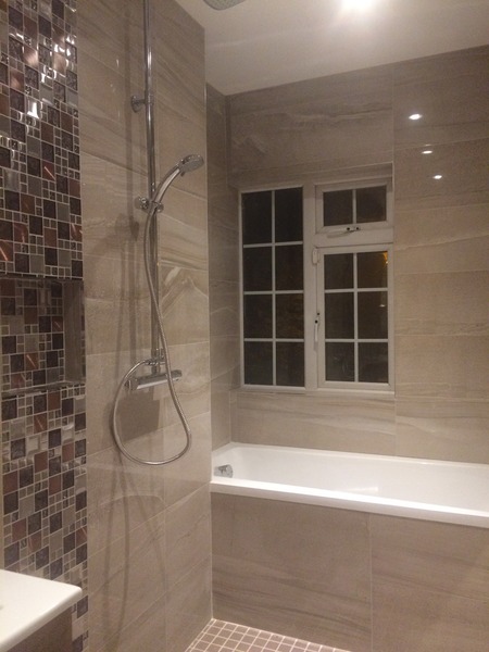 Walk-in shower (tiled floor as opposed to shower tray)